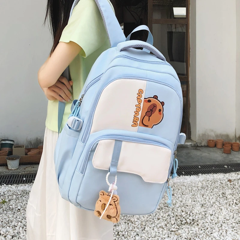 2025卡皮巴拉书包女小学生大容量减负双肩包初中高颜值简约背包