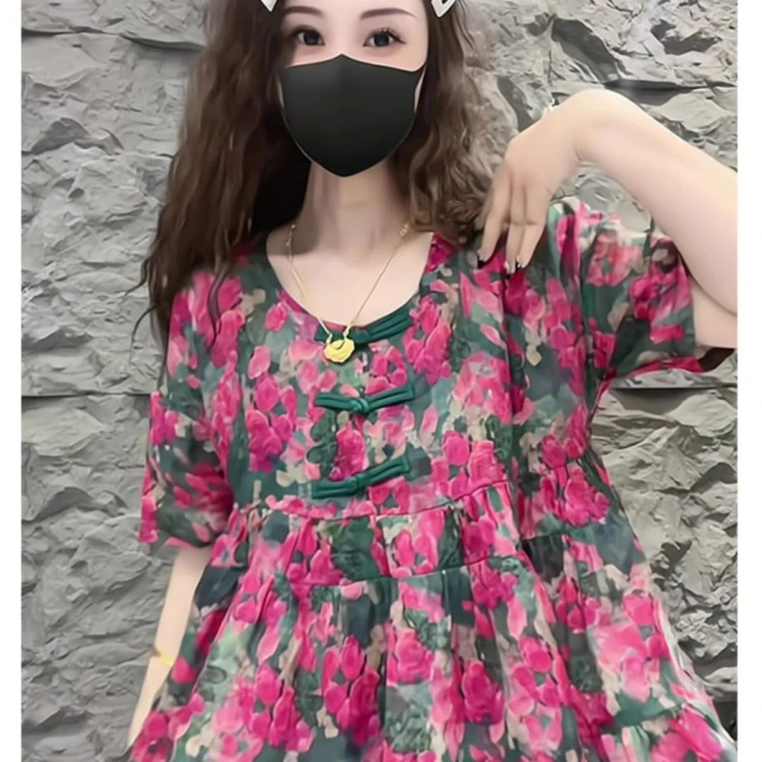 深圳南油高端女装2025夏季新款圆领设计感复古盘扣碎花短袖娃娃衫