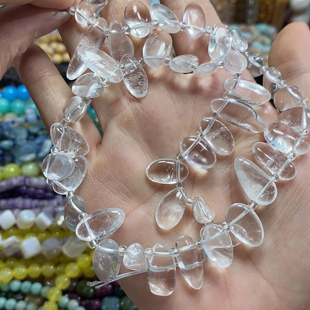 玛瑙/玉髓未镶嵌珠宝半成品天然白水晶长牙一条