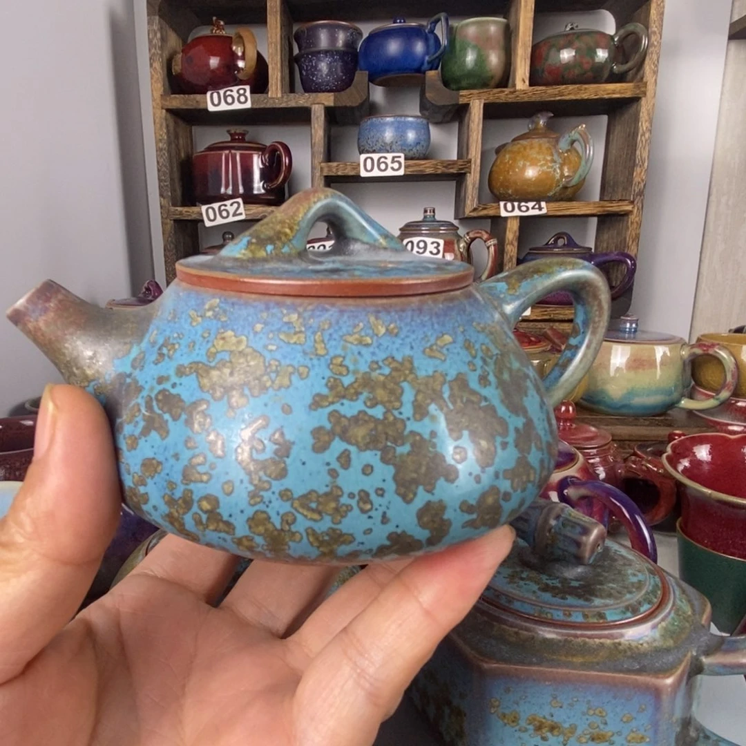 谢***E中国神后钧瓷茶具处理