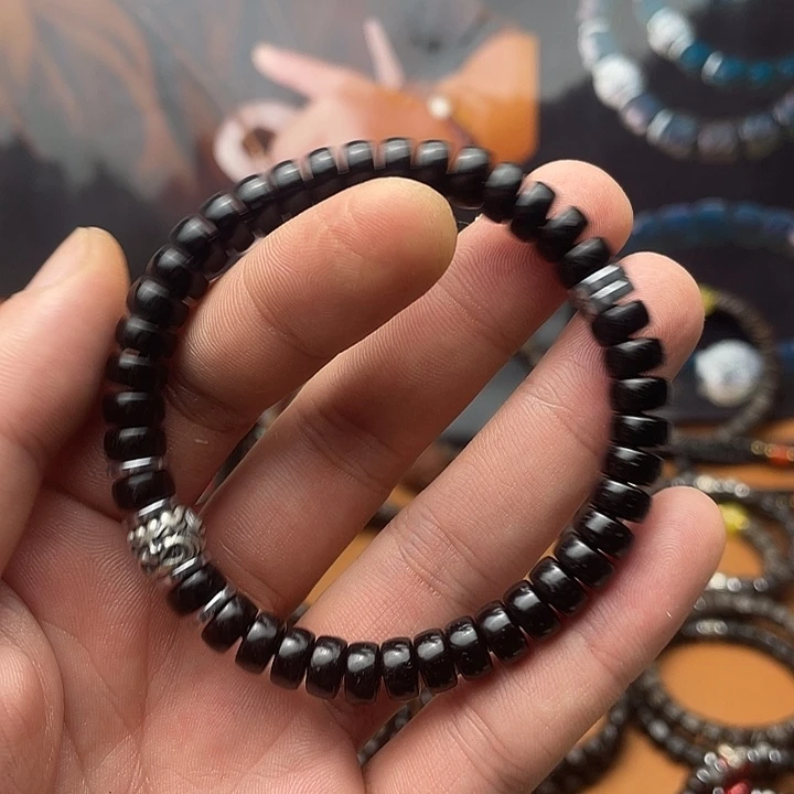 霍***林椰蒂手串8黑金药片吞金兽