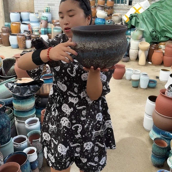 口25高18一个盆子。