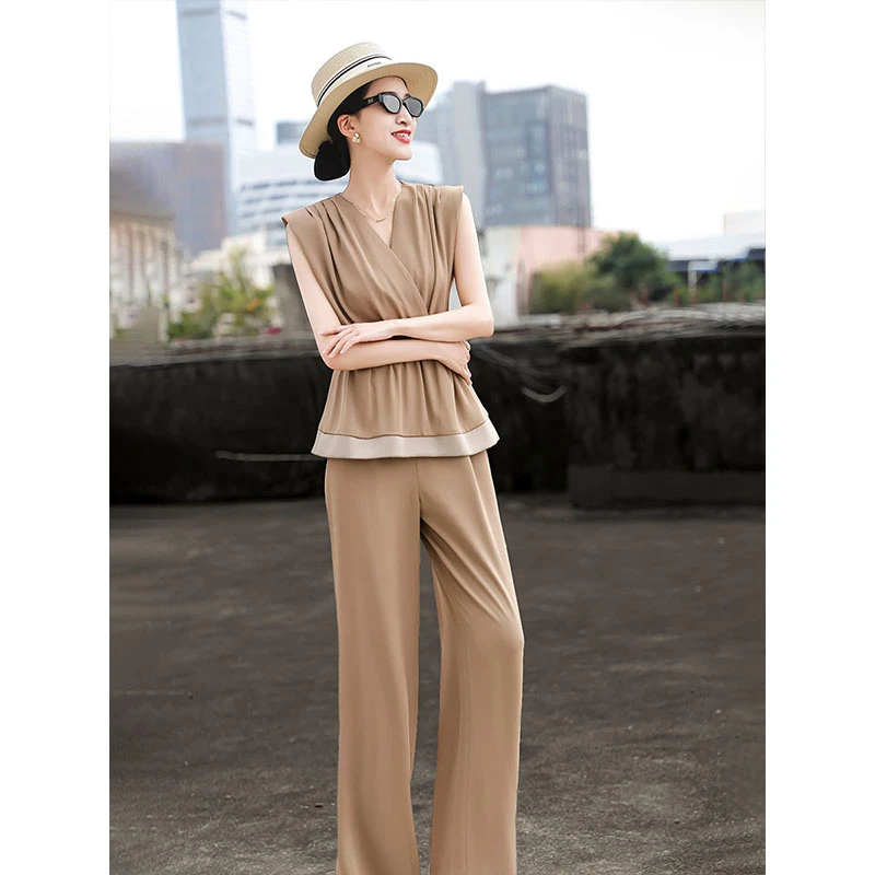 MEXCOCO/兰瑟儿2025夏季气质无袖简约时尚连体裤M5XH0223