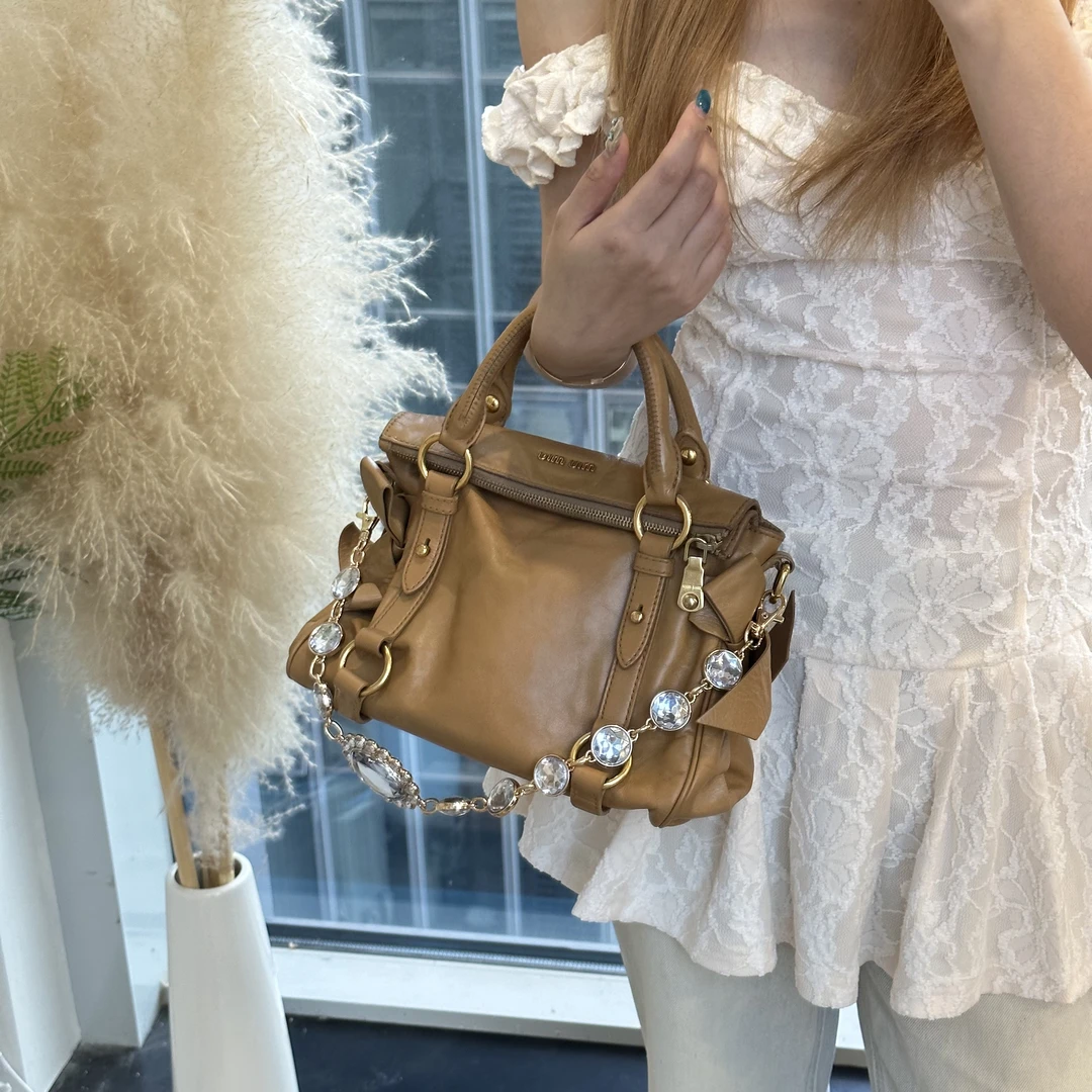 95新 MIU MIU/缪缪 奶茶色蝴蝶结手提包