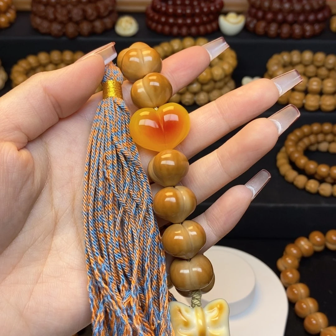 遇***o猴头全品18屁桃➕爱心蝴蝶结流苏