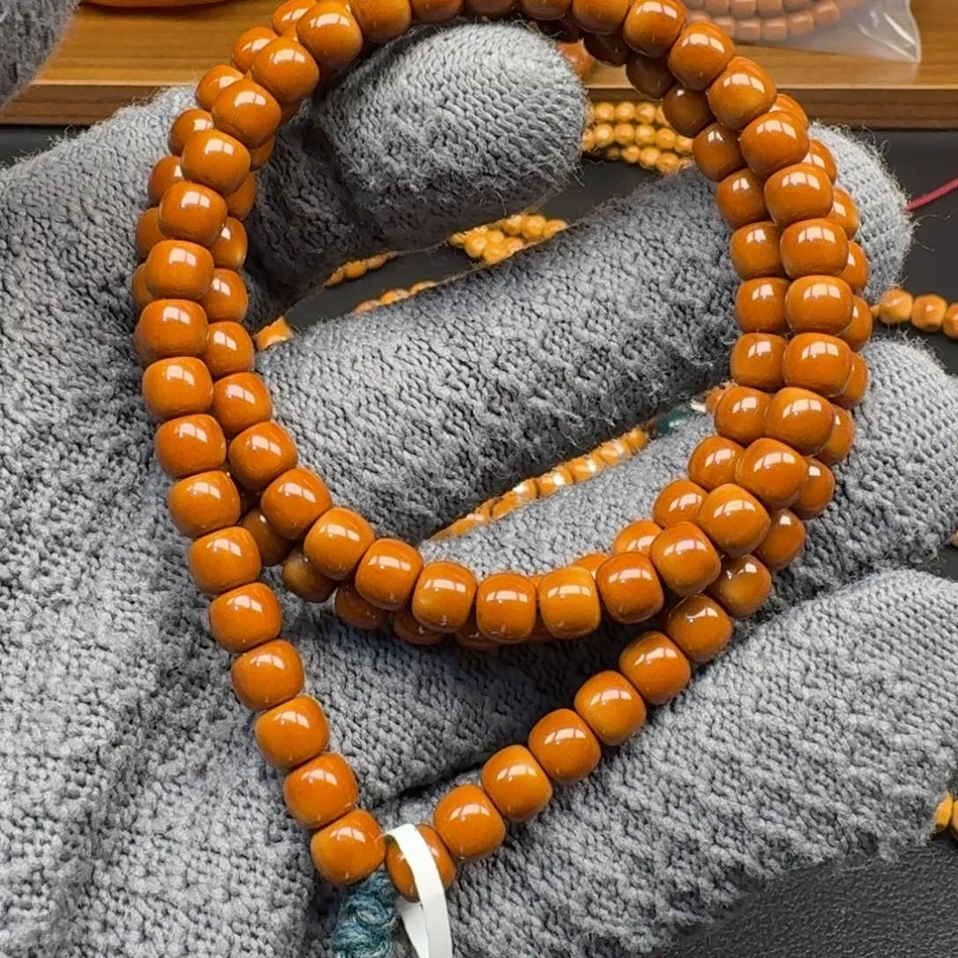 橄榄核手串/手链6.1老挝核尖红料108微微白