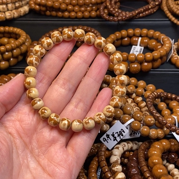 蜜****紫金鼠手串实心三花老型9