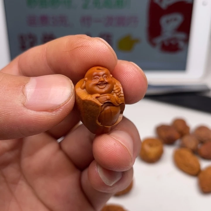橄榄核吊坠橄榄核雕刻单子。