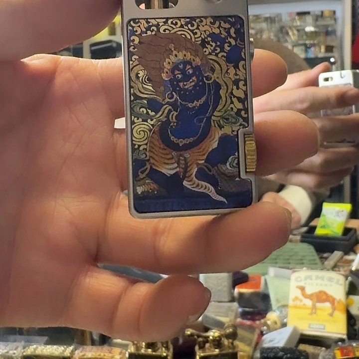 首领弹射黑财神打火机