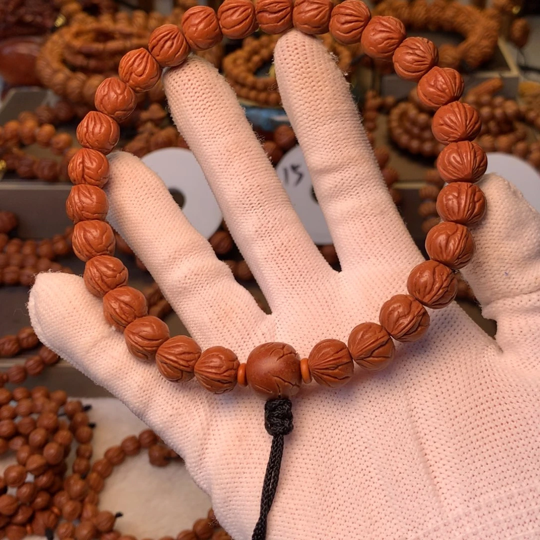 Q***。手串桃核秦岭龙纹