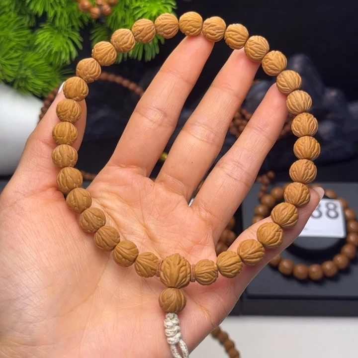 Y***K吊坠桃核凤羽0.9➕