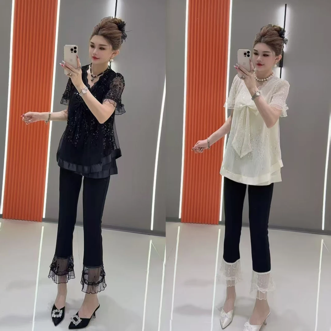 8058 早夏新款立体蝴蝶结网纱蕾丝亮片上衣加蕾丝边九分裤 两件套
