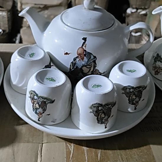 库存微瑕老寿星多孔茶壶一套