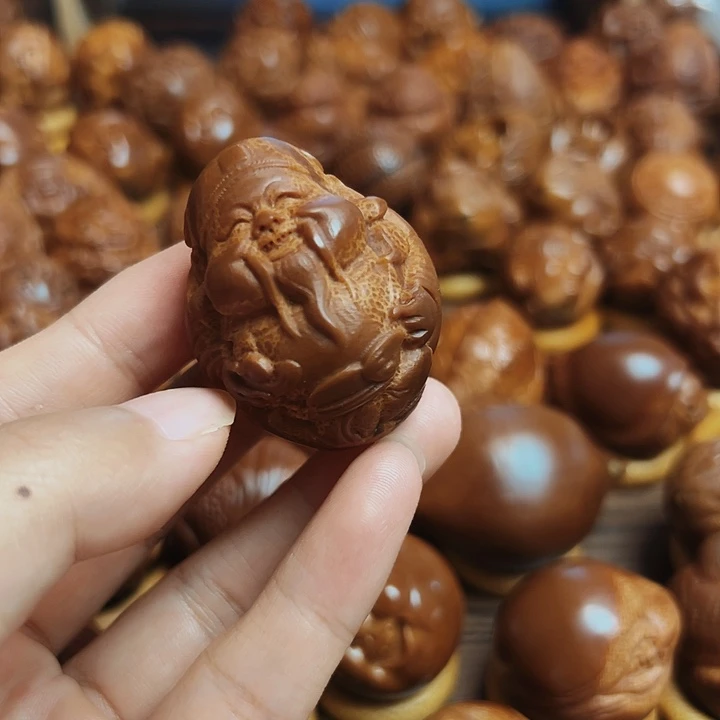 橄榄核把件昙**现财神一颗