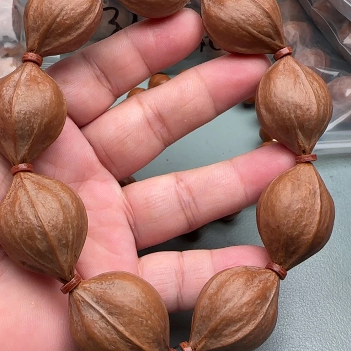 _***祛手串橄榄核橄榄核原皮铁核四花