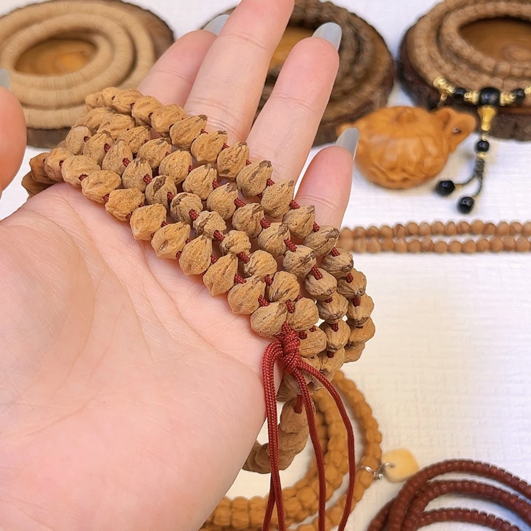 婉***~手串柏香籽/百香籽