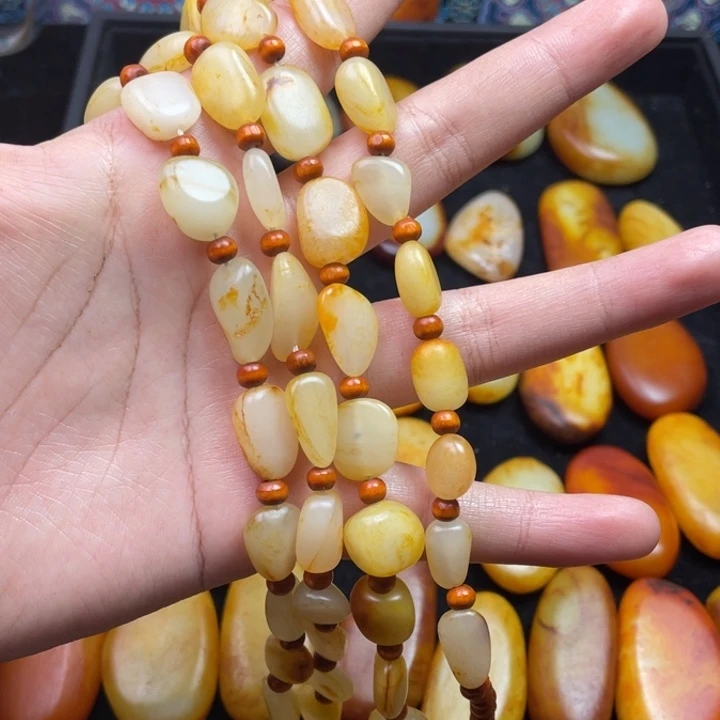 宁***博和田玉未镶嵌颈饰