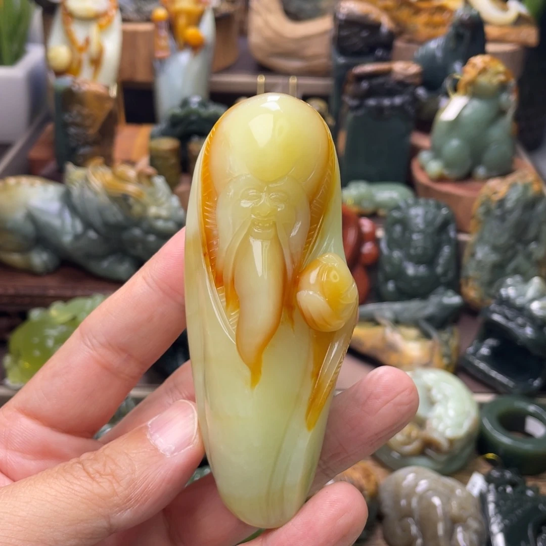 李***明蛇纹石玉未镶嵌手把件寿星