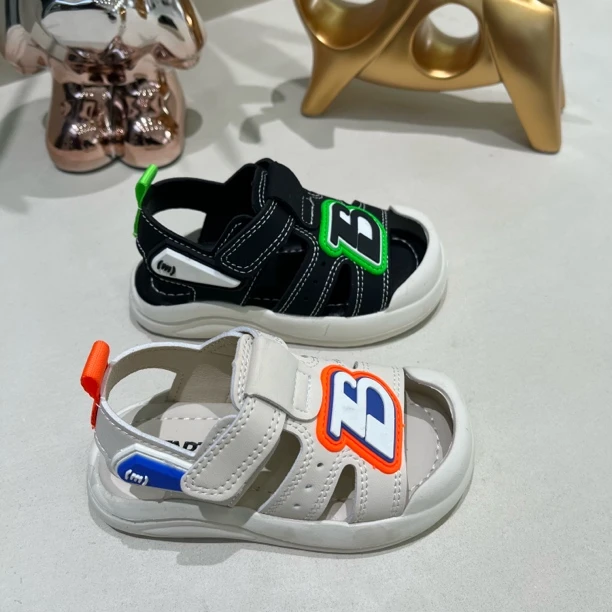 009-1夏季男镂空沙滩鞋中性女不限凉鞋包头软底透气男童鞋