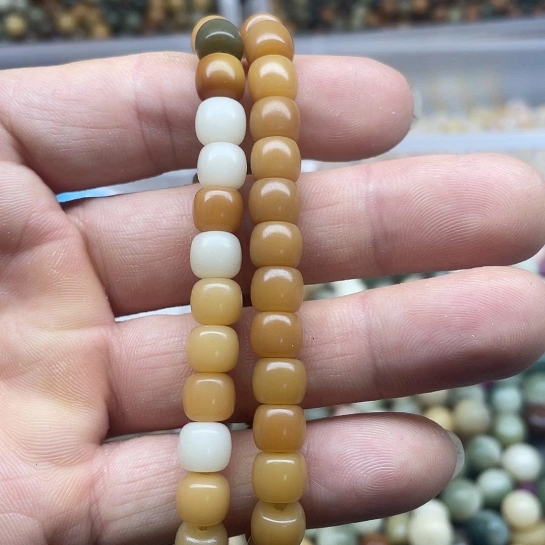 毓***咪白玉菩提吊坠卡8的手串2条