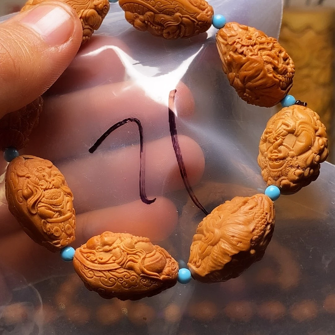 橄榄核吊坠 bnbbbjjjjjhjn