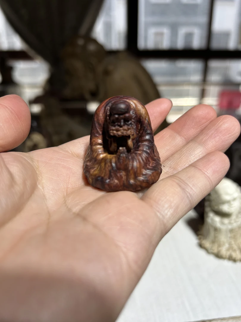 海黄小手把件达摩