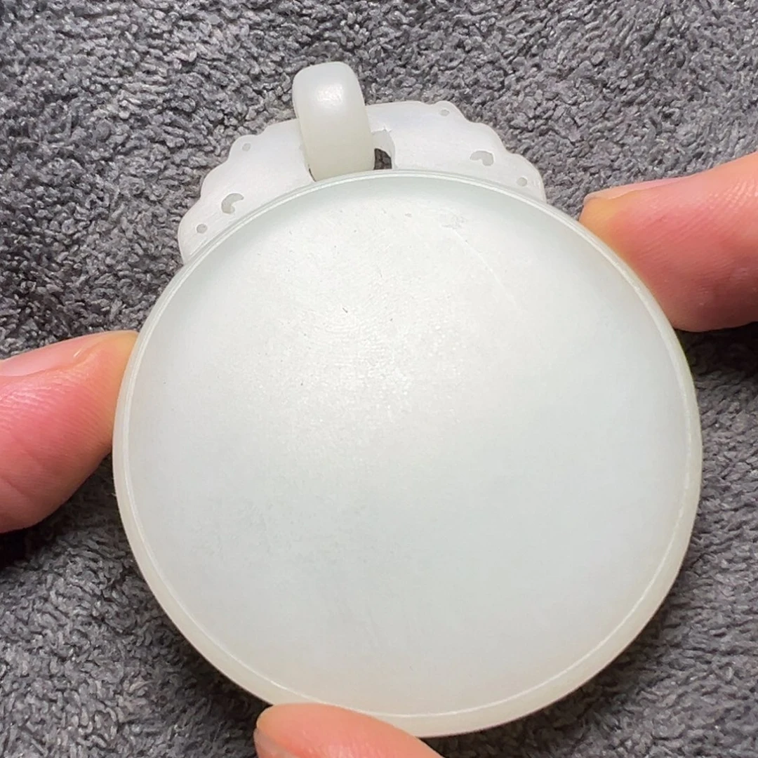 哈***瑞和田玉未镶嵌挂件