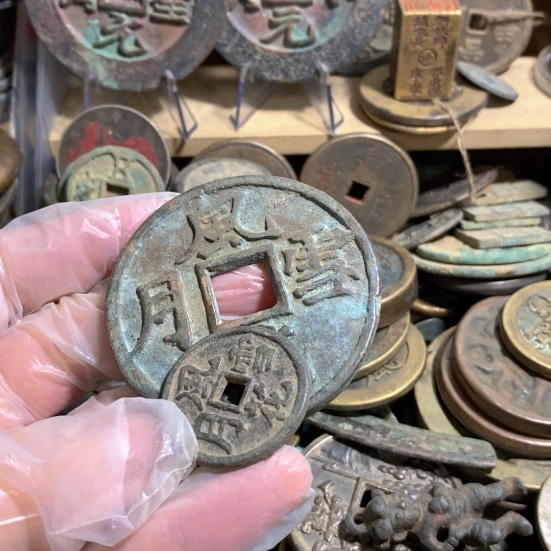 佐***儿铜现代工艺品学习币