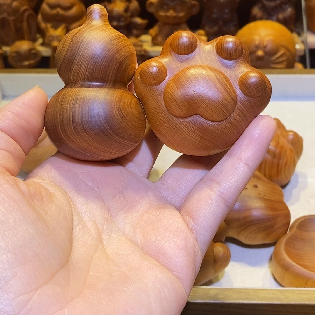 L***Z木崖柏木雕手把件