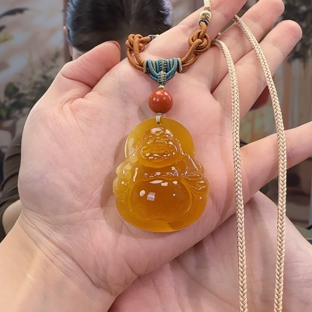 吴***呀蜜蜡吊坠(赠链)未镶嵌