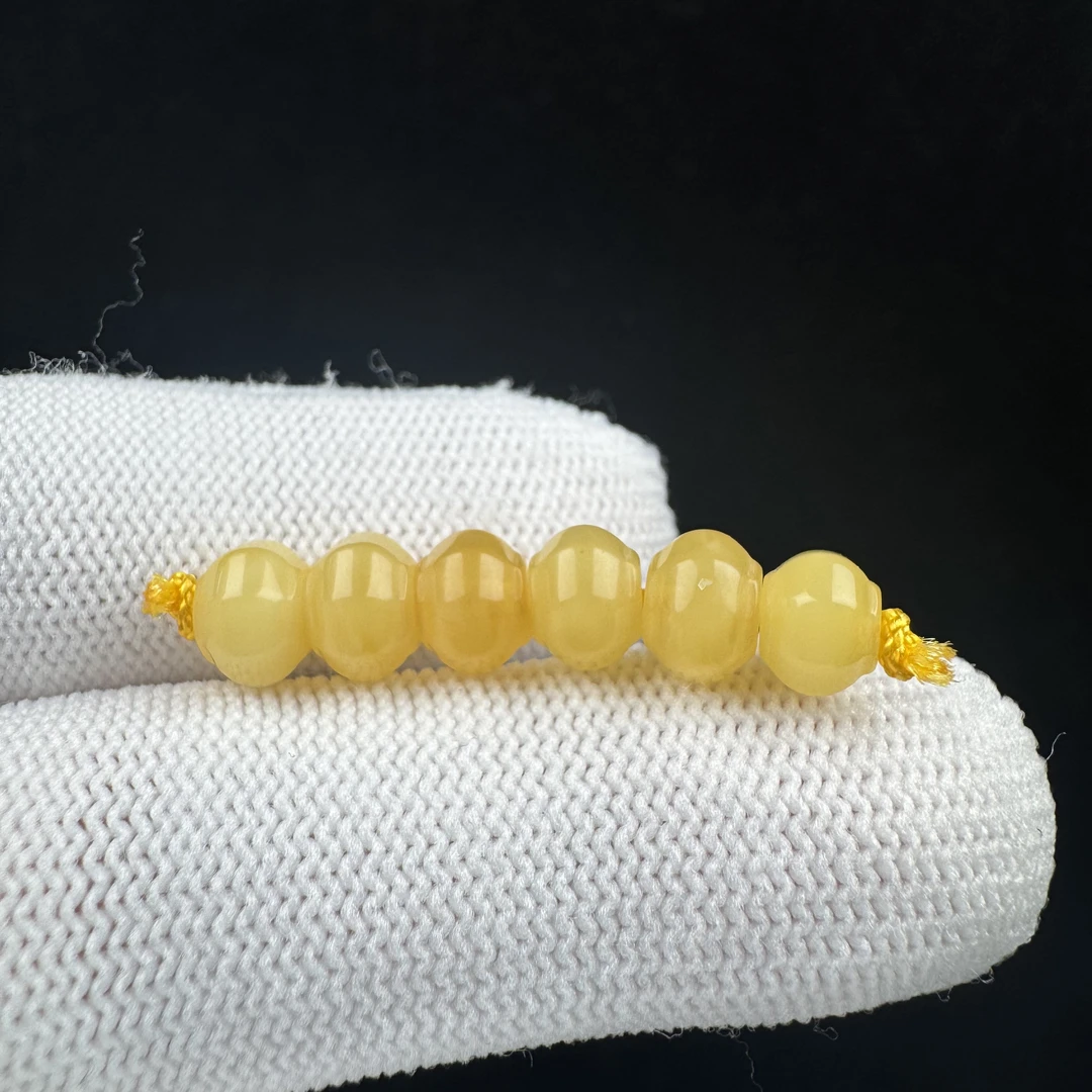 K4037天然原矿蜜蜡 隔珠6.6mm支持复检假一罚十