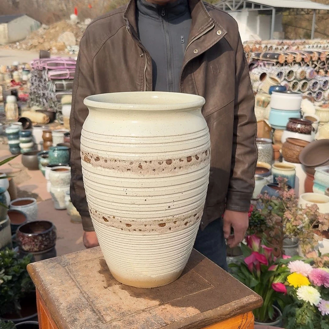 紫砂花盆口19高30（一个白色圈圈老庄