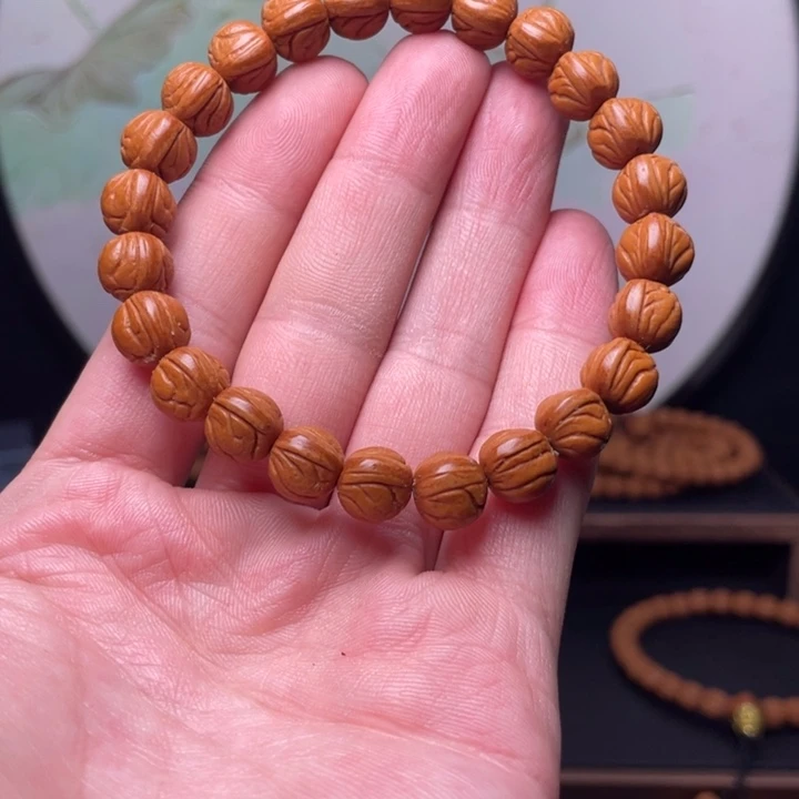 刘***泽桃核手串10玉龙脊手串