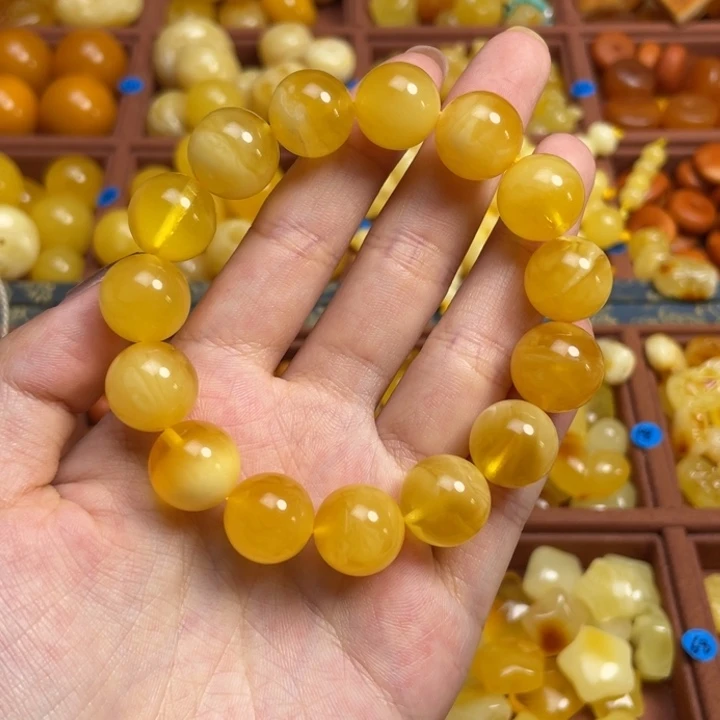 蜜蜡未镶嵌珠宝奇石原矿鸡油黄聚宝盆妖花圆珠手串13+