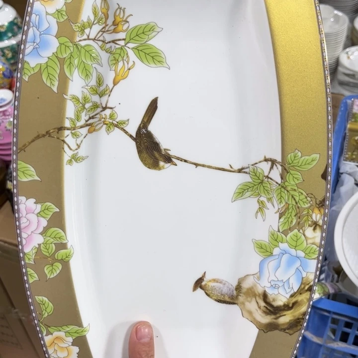 骨瓷琴瑟鱼盘一个微瑕