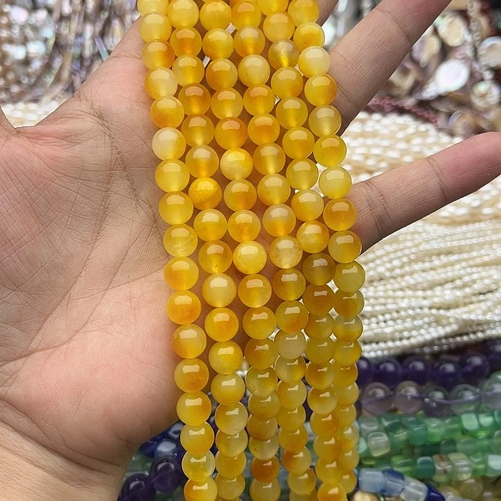 玛瑙/玉髓未镶嵌珠宝半成品一条8mm黄飘花