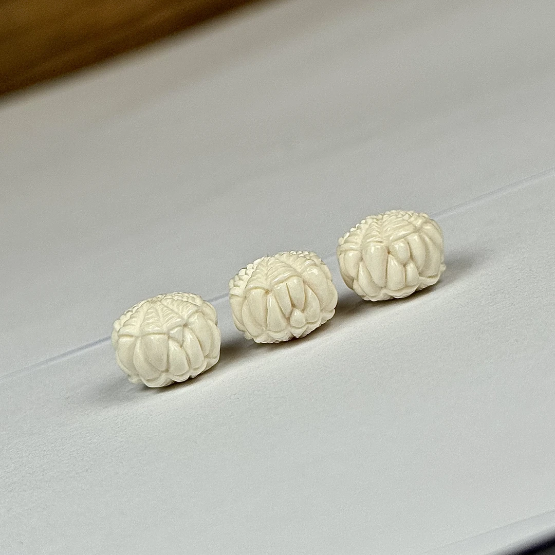 A169天然猛犸象牙 吞噬珠约12×10mm随机一个发货