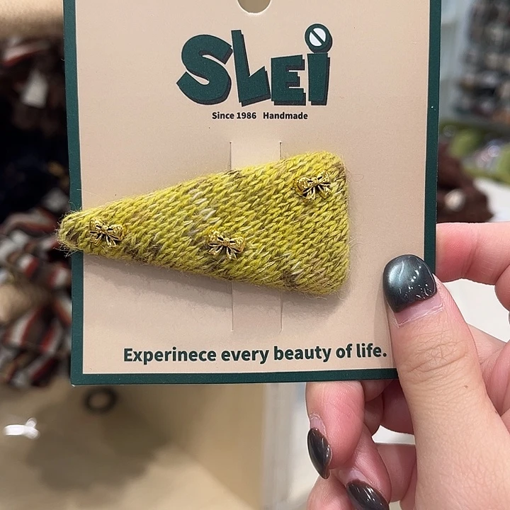 布艺非金属黄色蝴蝶结拜拜夹