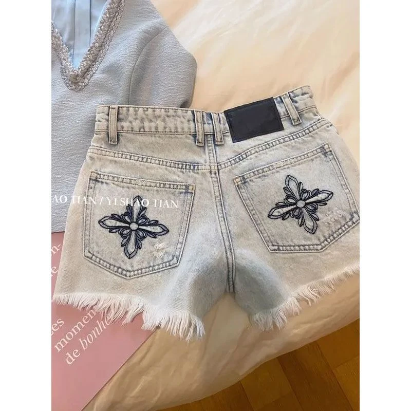 辣妹复古做旧水洗刺绣毛边牛仔短裤女2025新款夏高腰甜酷A字热裤