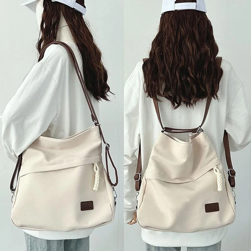 一包三用背包双肩包书包女学生2025新款帆布包包单肩托特包斜挎包