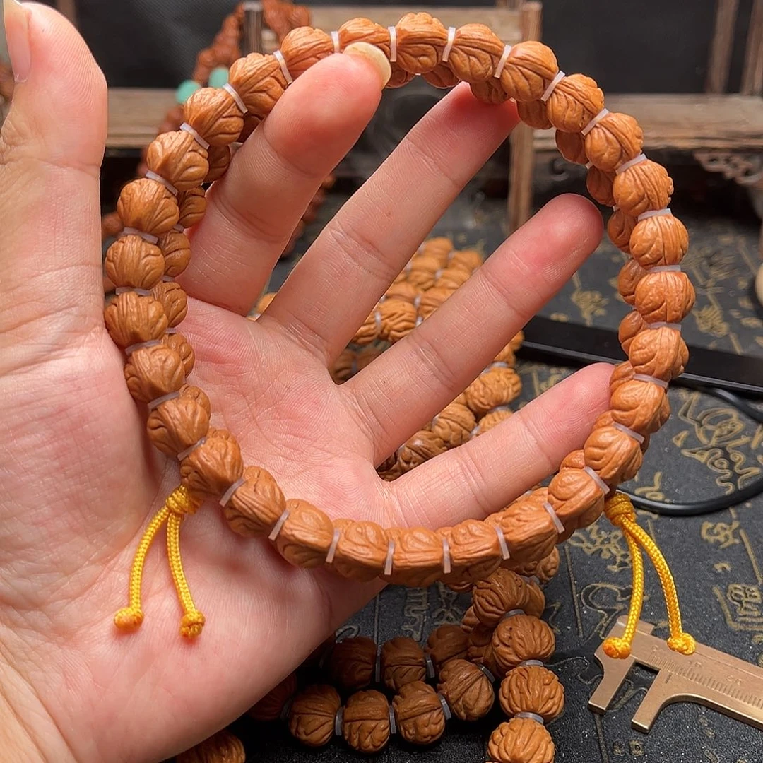 桃核吊坠玉龙手持