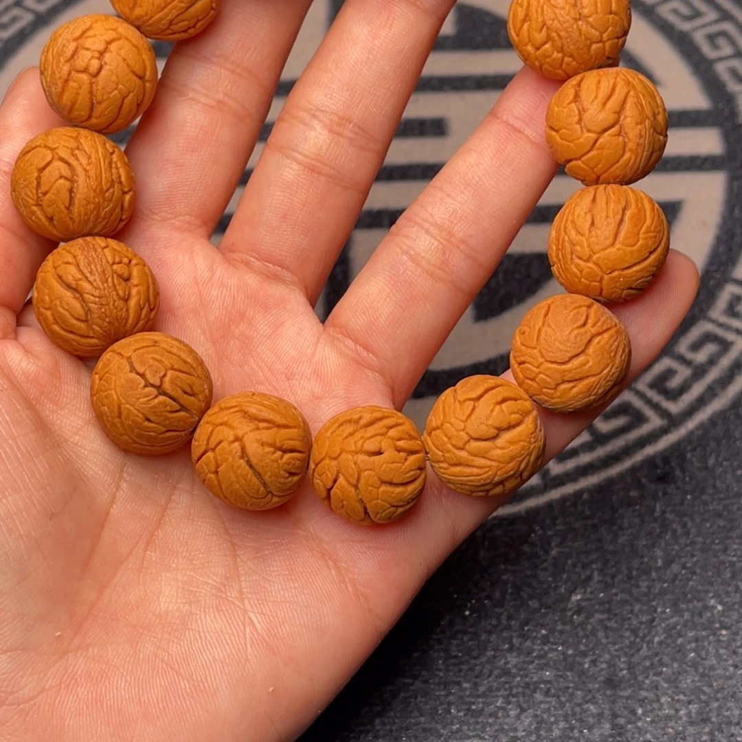 桃核手串金丝龙珠18