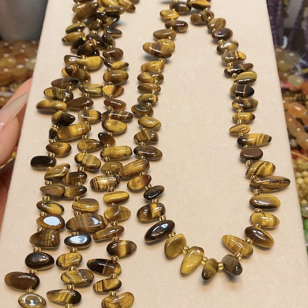 散珠玛瑙/玉髓闪电虎眼长牙一条