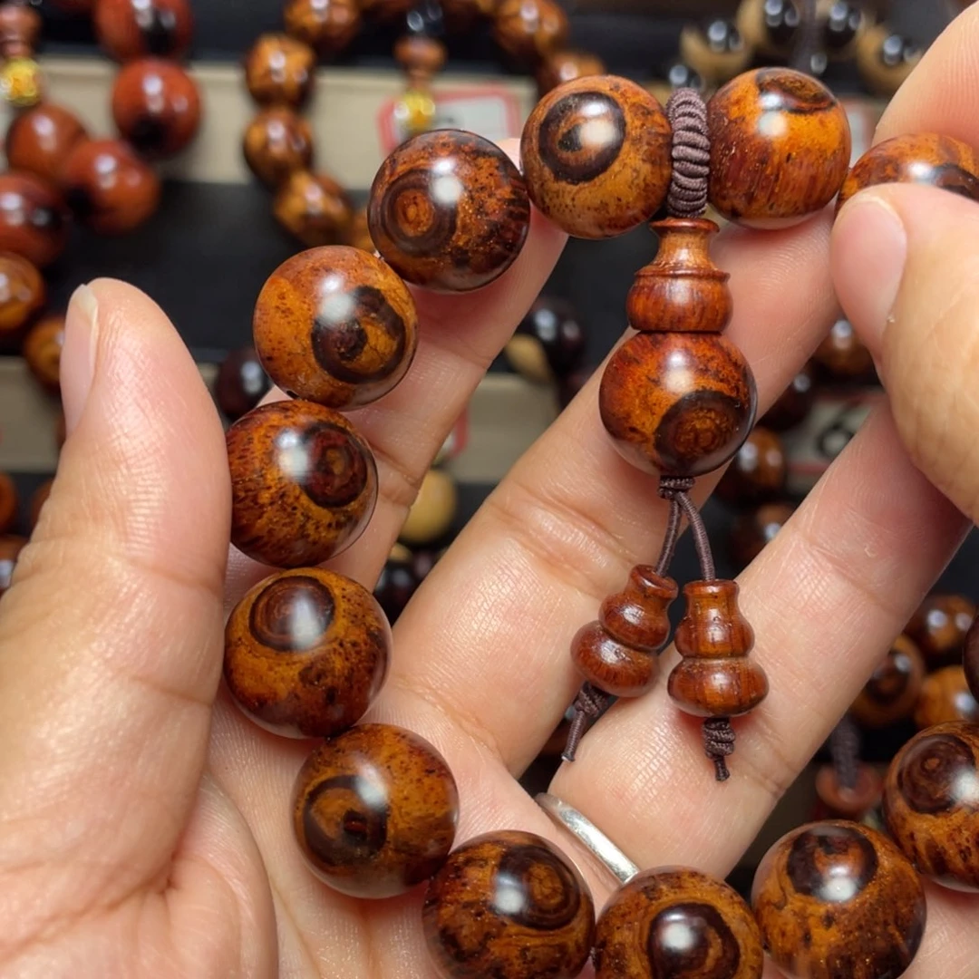 则***、黄花梨/降香黄檀1.5双面天眼