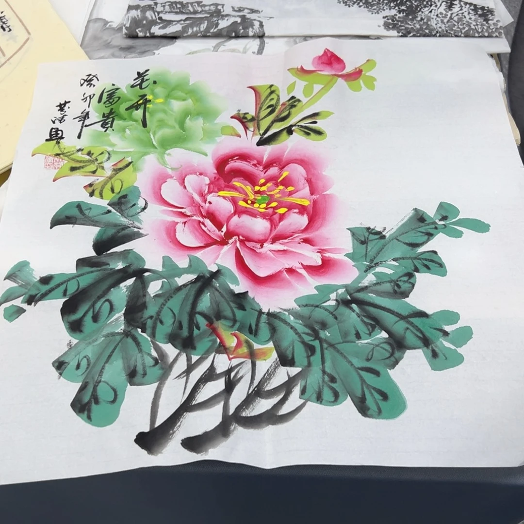 国画卖字画的小男孩