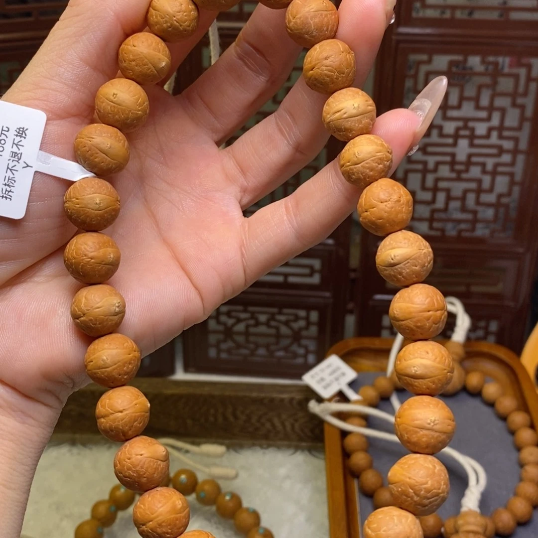 凤眼菩提手串的*良12.5素手持33颗