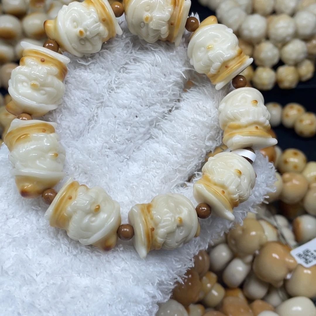 菩提根/象牙果手串12.23.48瑕圣诞老人