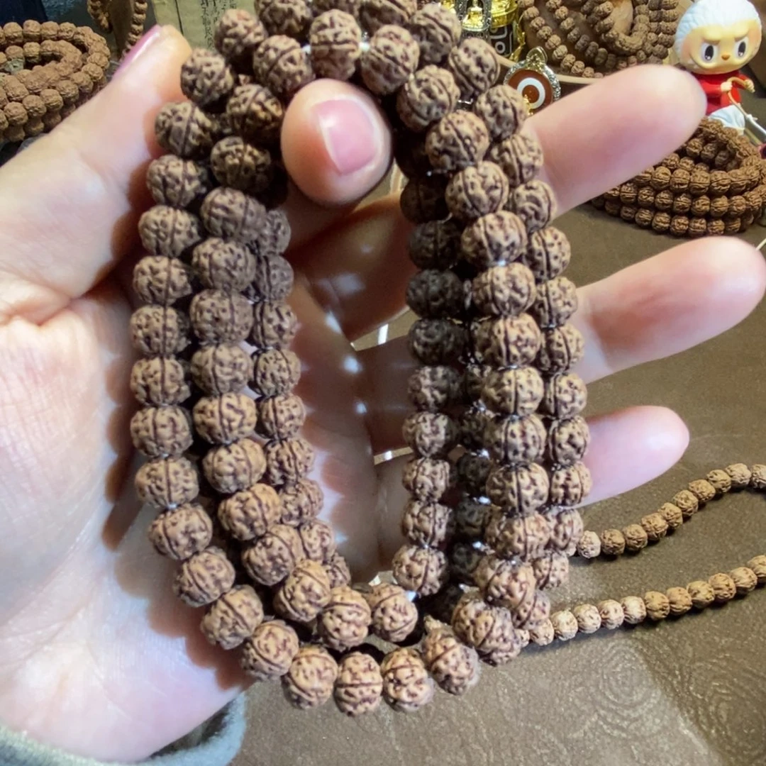 ଲ***…金刚菩提吊坠精挑虎爪梅花108