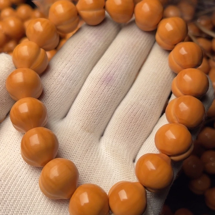 A***。猴头核桃手串屁桃