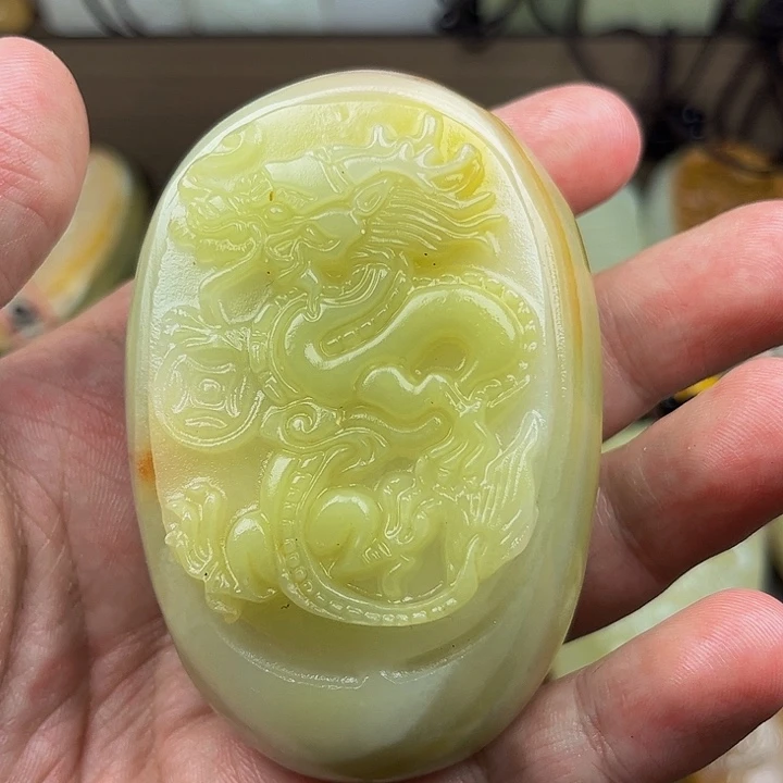 ****心石材方解石手把件龙